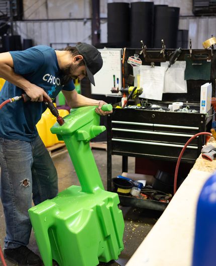 Man drilling into mold